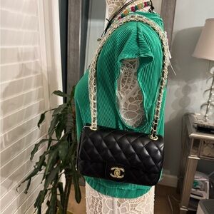 CHANEL Black Quilted Shoulder Bag with Silver Chain